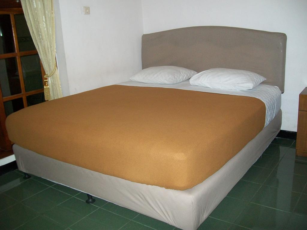 Krowi Inn Сурабая Стая снимка